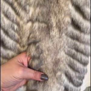 Chico’s size 2 furry vest. Super cute & cozy. Worn a handful of times. Pockets!